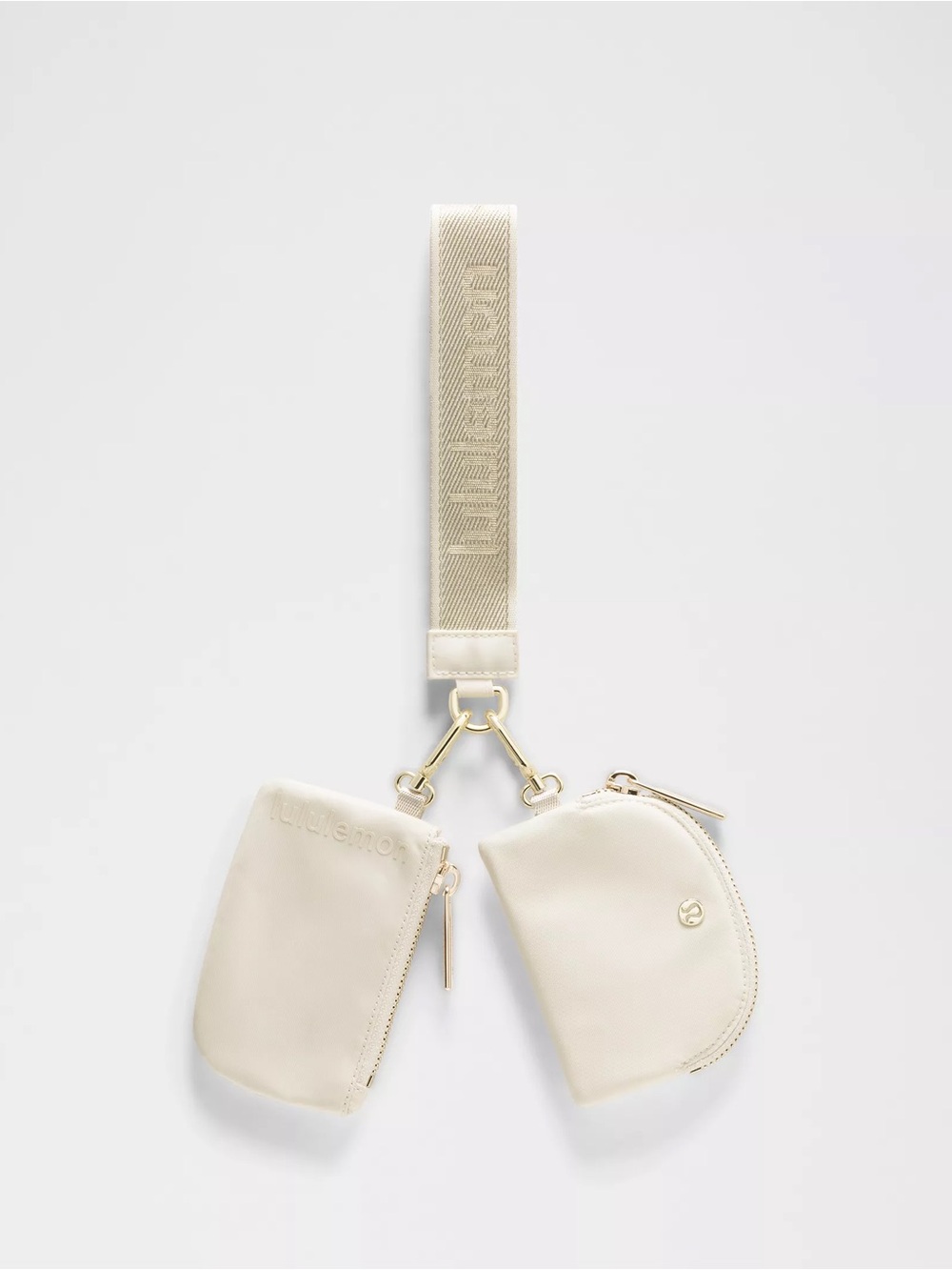 149 🆕✨ Lululemon Dual Pouch Wristlet Metallic Wordmark - Light Ivory
